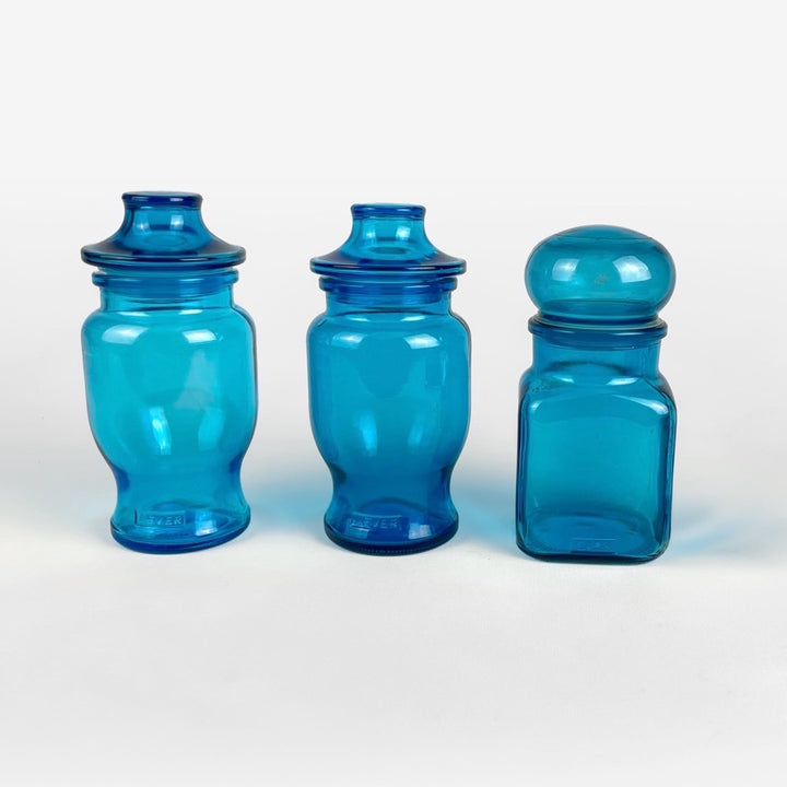 3 bocaux publicitaires en verre bleu moulé années 70
