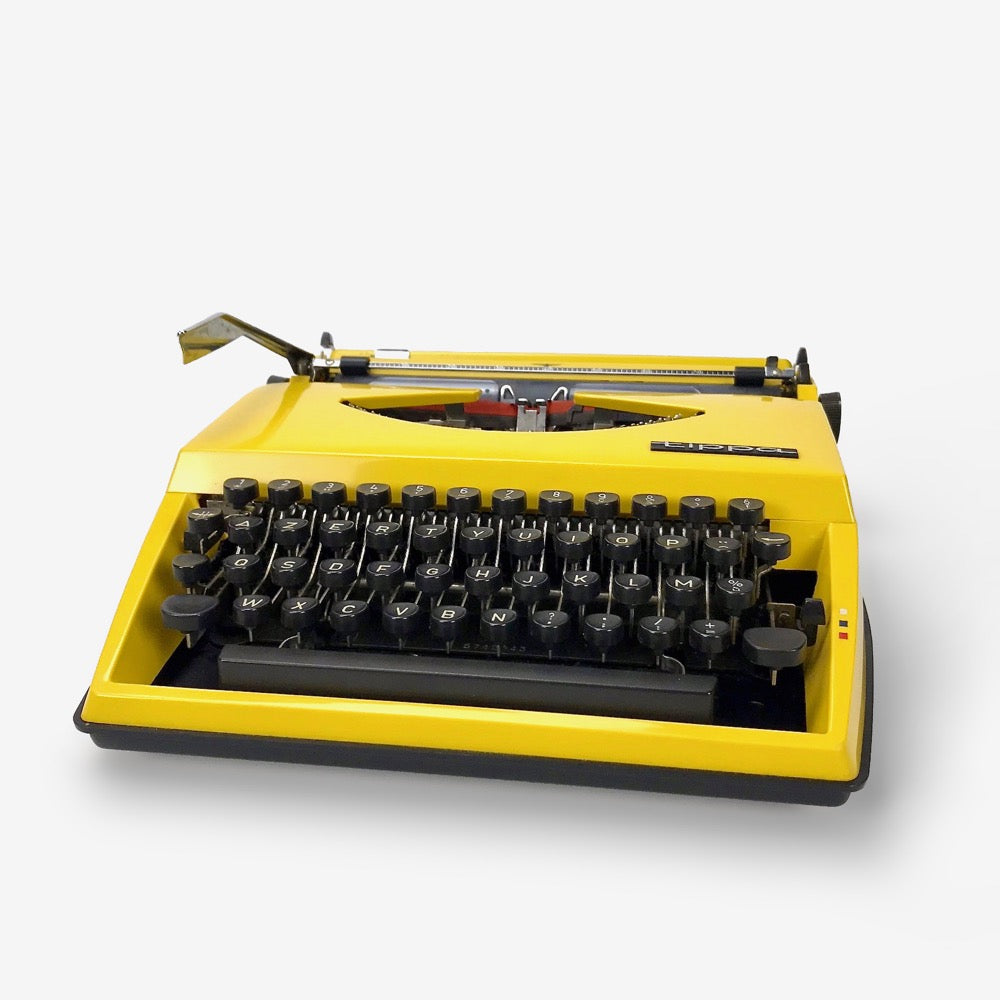 Machine à écrire jaune Tippa des années 70 – Zelda et Charlie