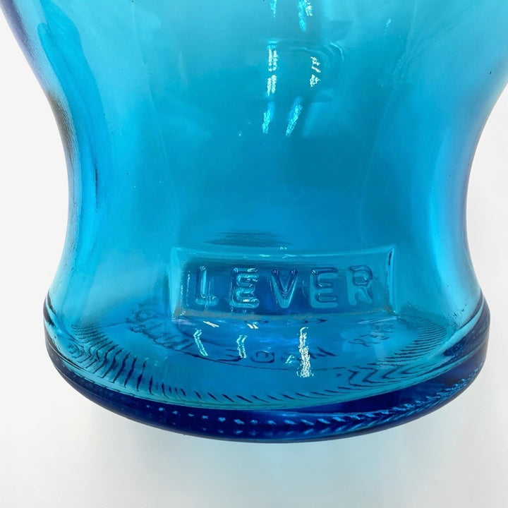 Bocaux publicitaires en verre moulé bleu et vert années 70