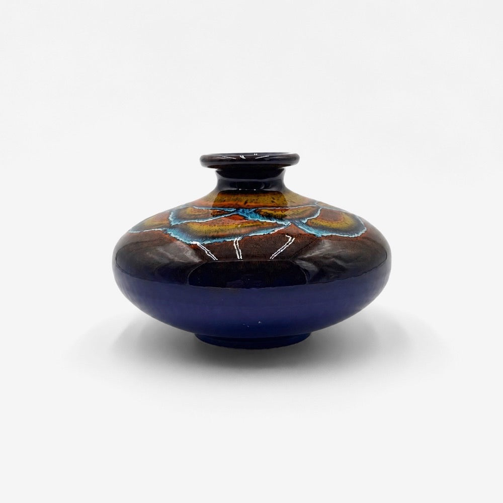 Vase galet en céramique émaillée polychrome vintage