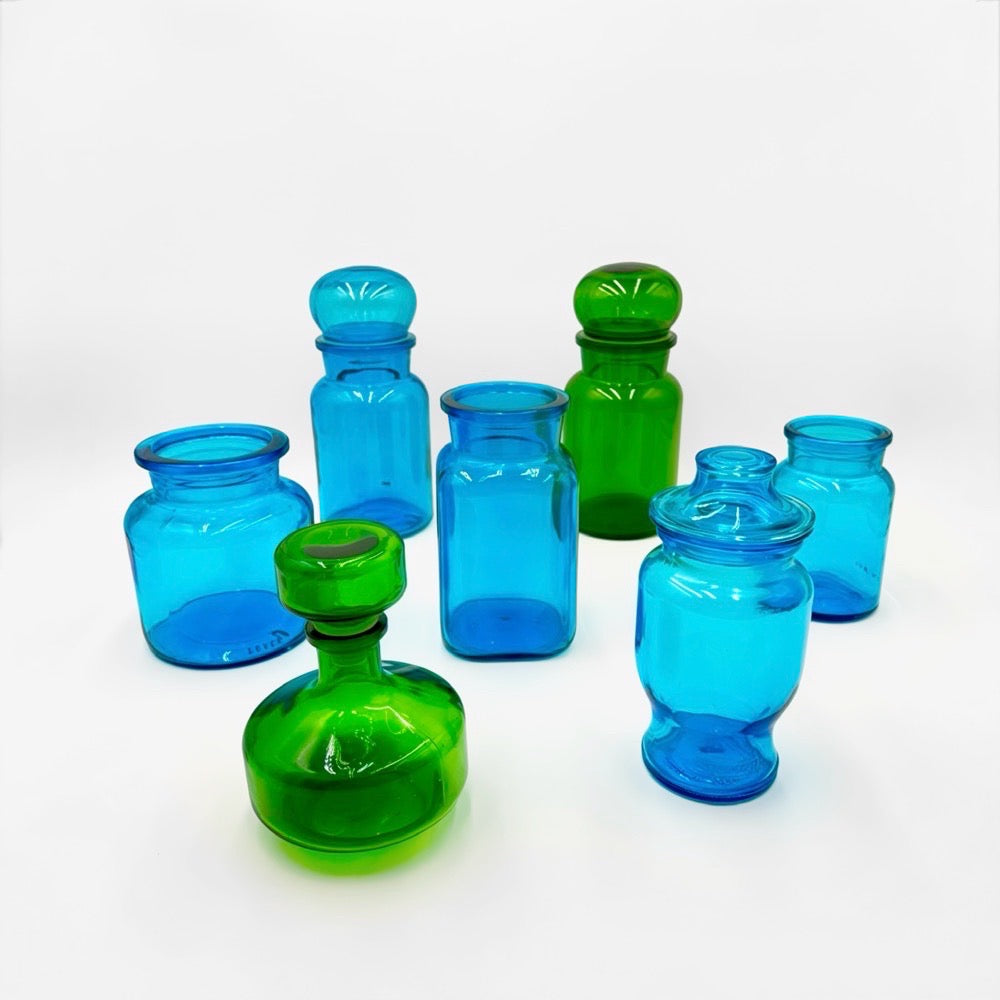 Bocaux publicitaires en verre moulé bleu et vert années 70