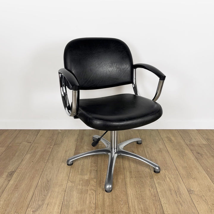 Fauteuil coiffeur skaï noir et chrome années 80