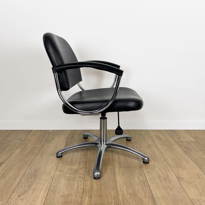 Fauteuil coiffeur skaï noir et chrome années 80