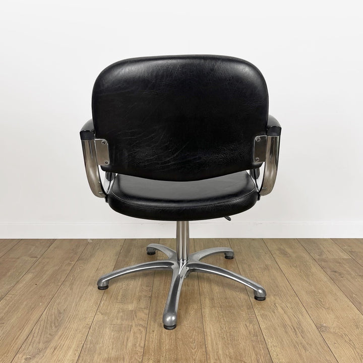 Fauteuil coiffeur skaï noir et chrome années 80