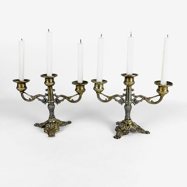 Paire de chandeliers rococos métal doré