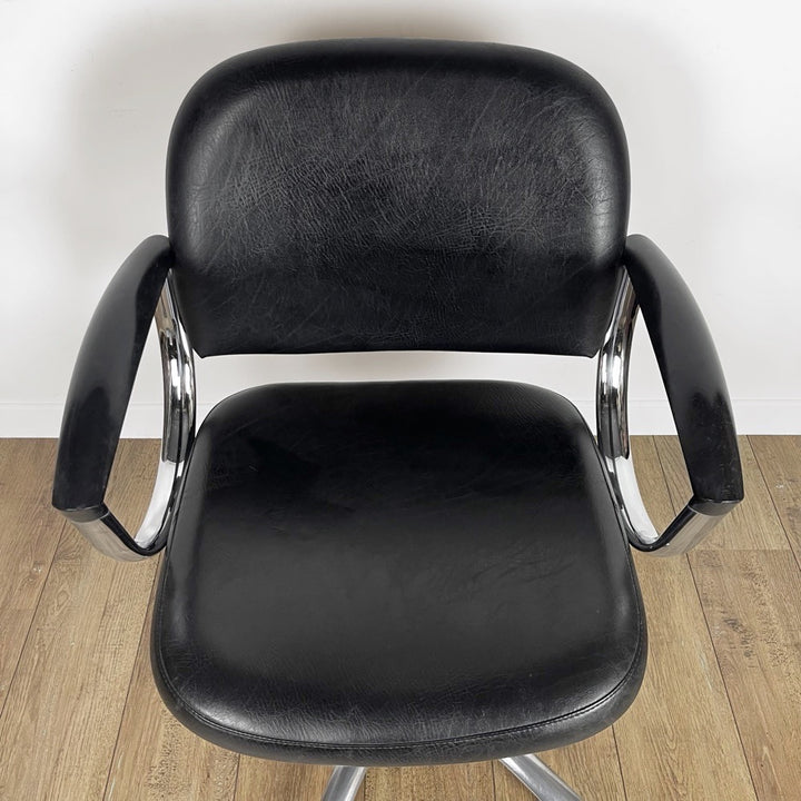 Fauteuil coiffeur skaï noir et chrome années 80