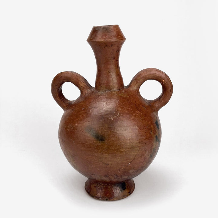 Ancienne cruche artisanale subsaharienne en terre cuite