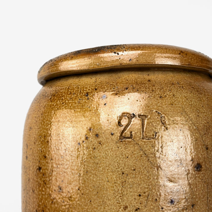 Duo d'anciens pots à sel en grès vernissé