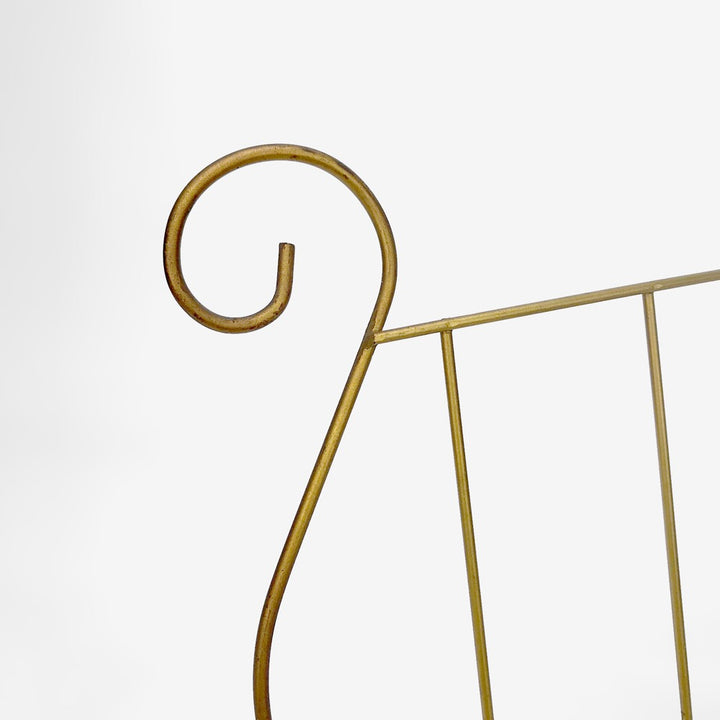 Porte-revues lyre en métal doré