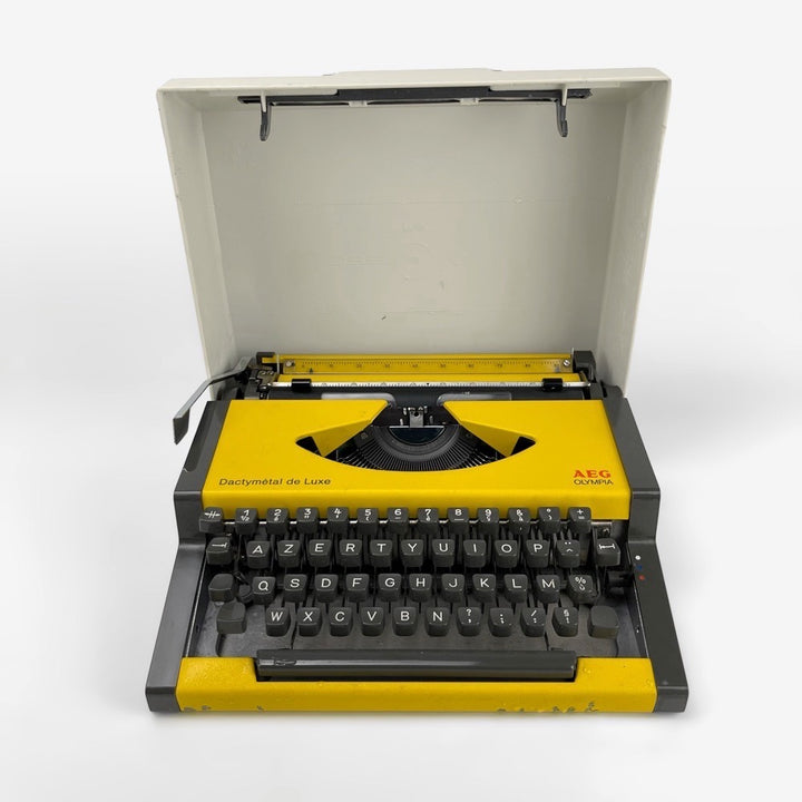 Machine à écrire Dactymétal de Luxe AEG Olympia jaune