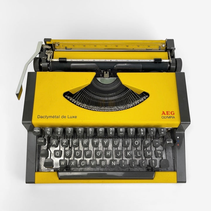 Machine à écrire Dactymétal de Luxe AEG Olympia jaune