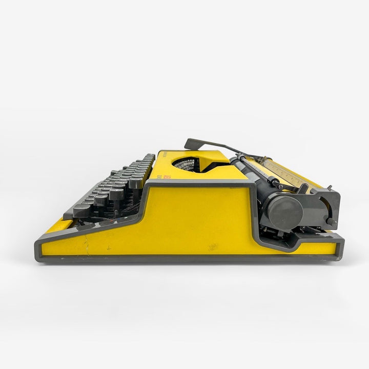 Machine à écrire Dactymétal de Luxe AEG Olympia jaune