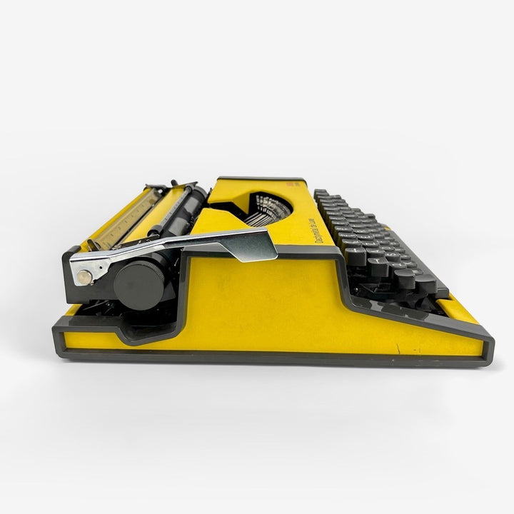 Machine à écrire Dactymétal de Luxe AEG Olympia jaune