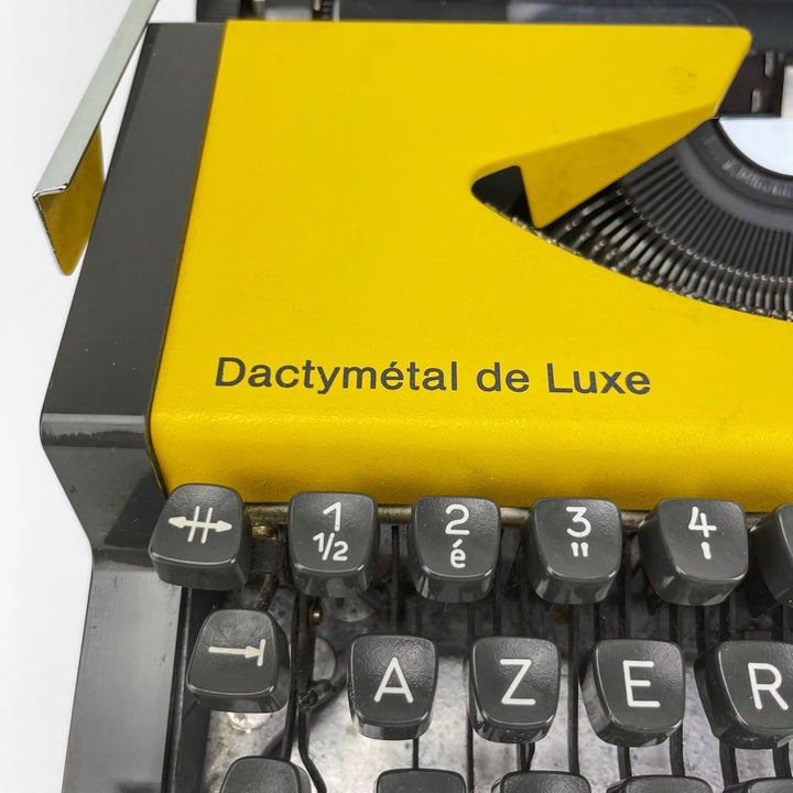 Machine à écrire Dactymétal de Luxe AEG Olympia jaune