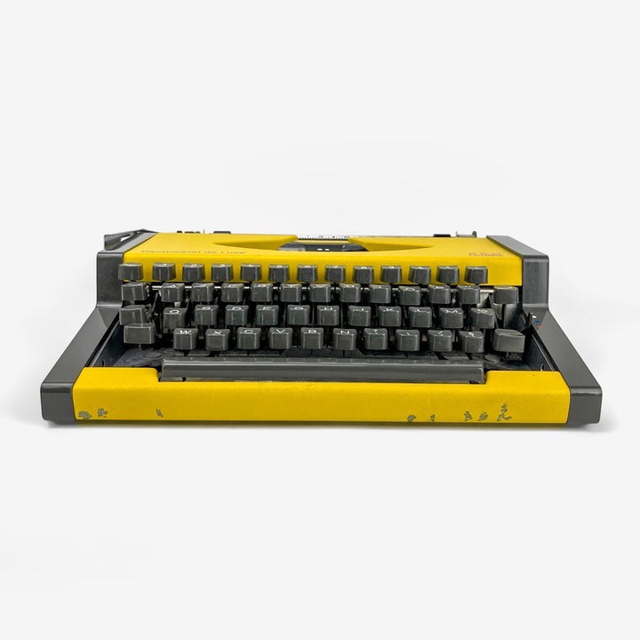 Machine à écrire Dactymétal de Luxe AEG Olympia jaune