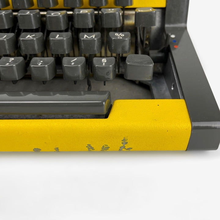 Machine à écrire Dactymétal de Luxe AEG Olympia jaune