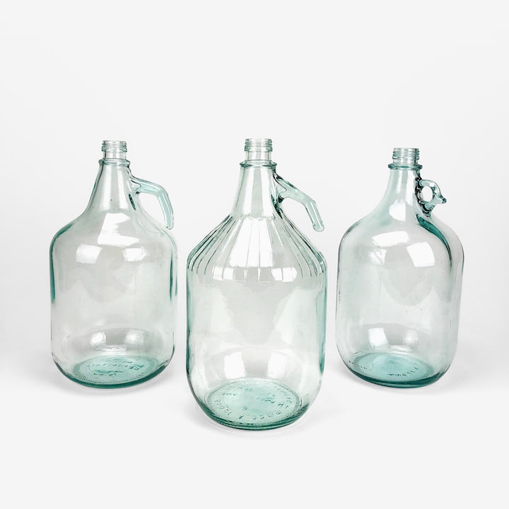 Trio de bonbonnes à anse transparentes