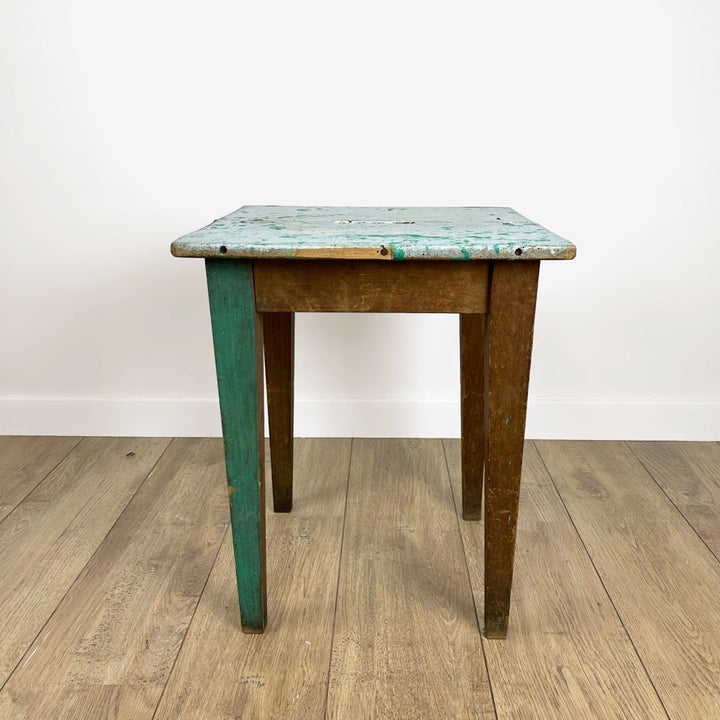 Ancien tabouret à fente en bois