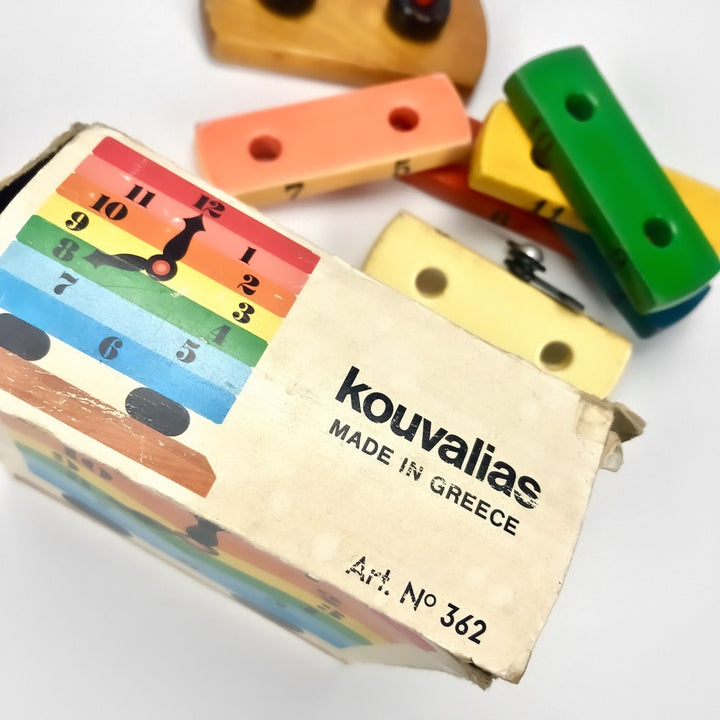 Jouet pendule en bois de marque Kouvalias