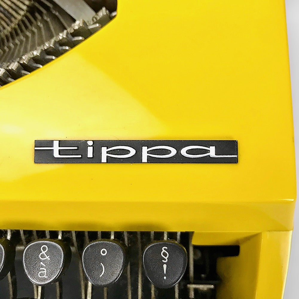 Machine à écrire jaune Tippa des années 70