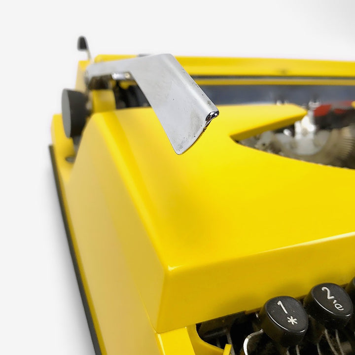 Machine à écrire jaune Tippa des années 70