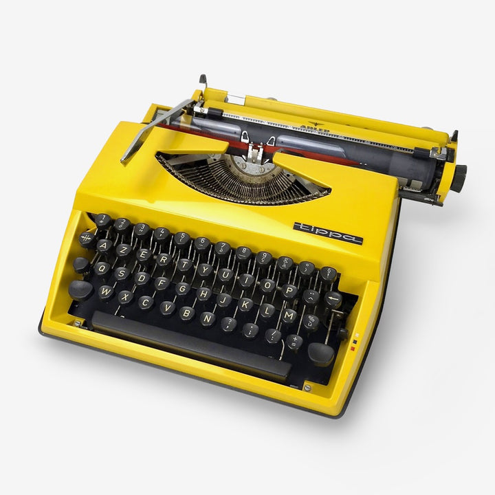 Machine à écrire jaune Tippa des années 70