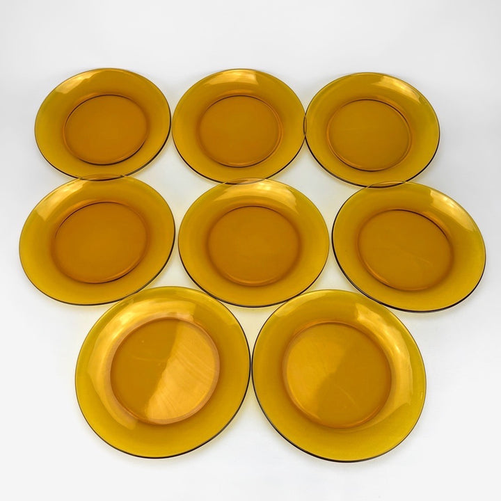 8 assiettes plates Duralex verre ambré années 70