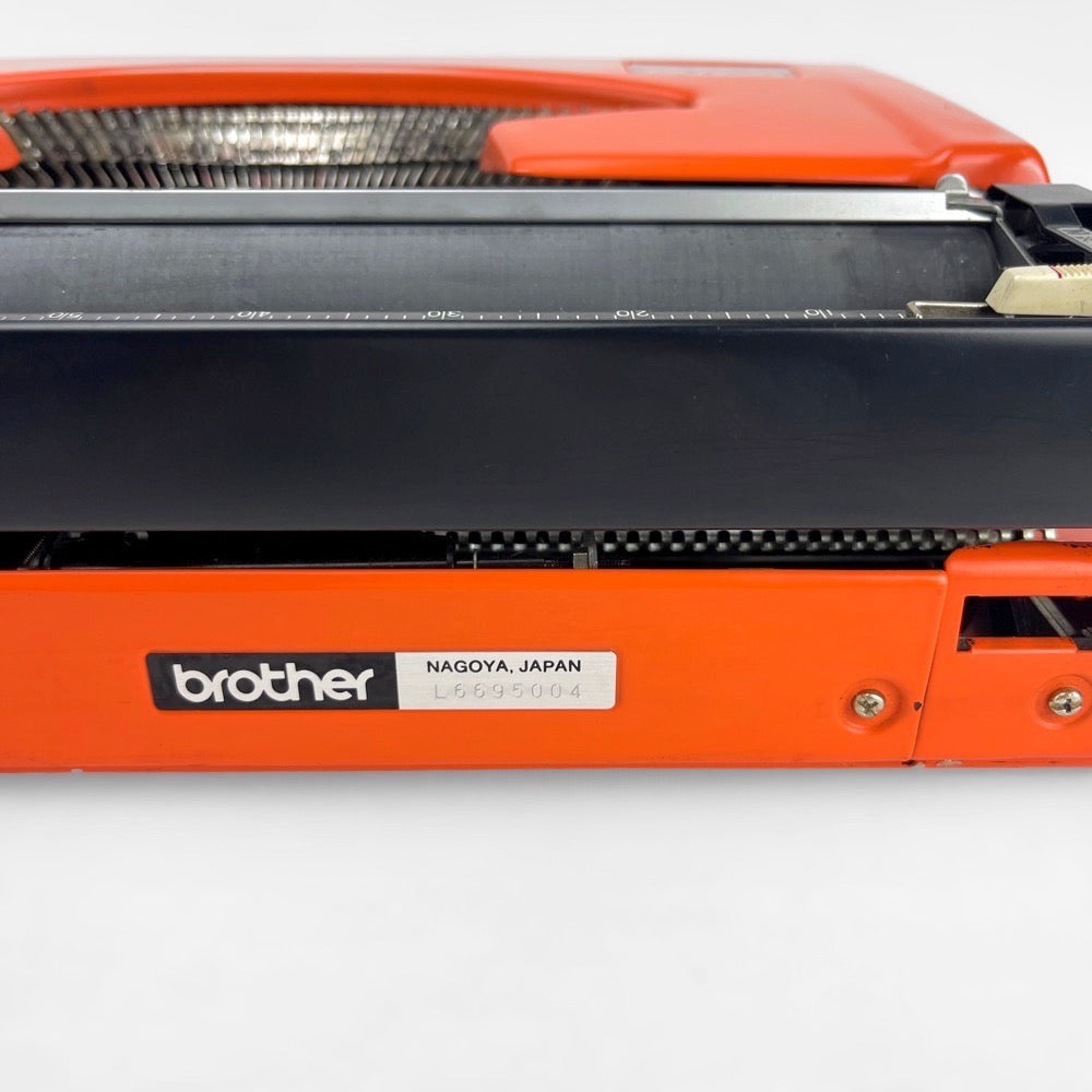 Machine à écrire Brother 210 orange vintage