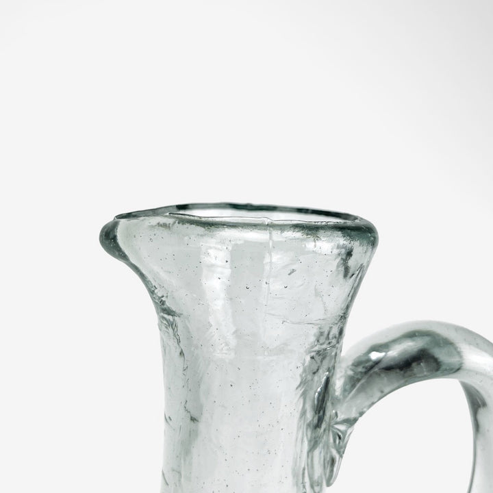 Ancienne cruche à eau en verre soufflé