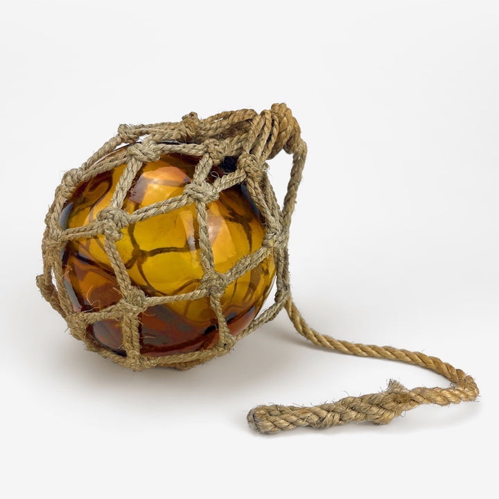 Ancienne boule de chalut verre ambré et corde
