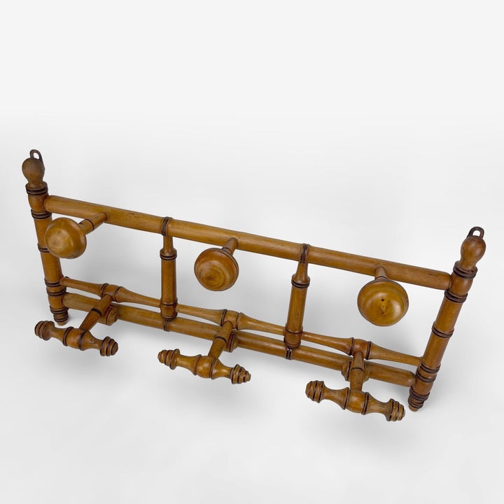 Ancien porte-manteaux en cadre à patères fixes et mobiles