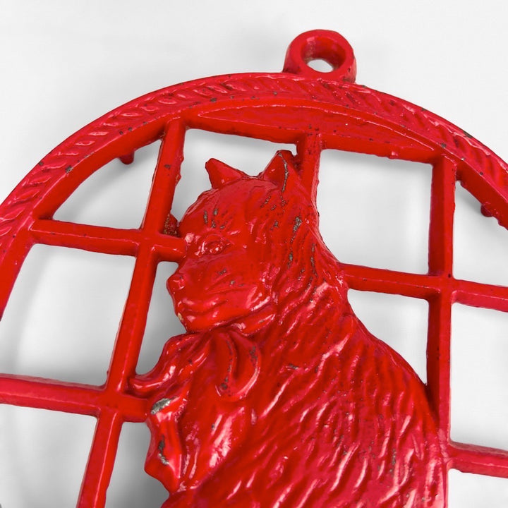 Dessous de plat rouge en fonte décor chat
