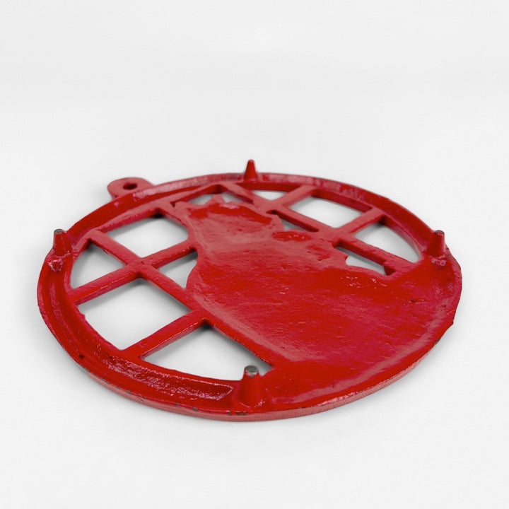 Dessous de plat rouge en fonte décor chat