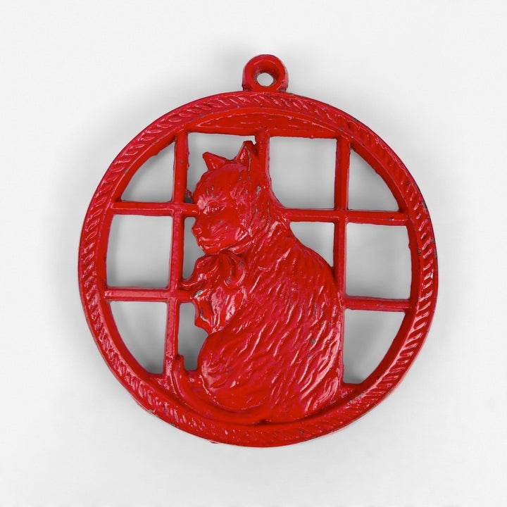 Dessous de plat rouge en fonte décor chat